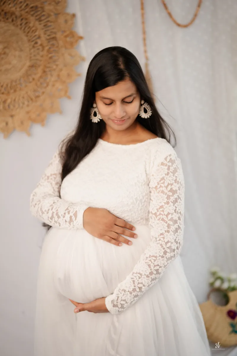 Fine-art maternity portrait celebrating the season of waiting · 03