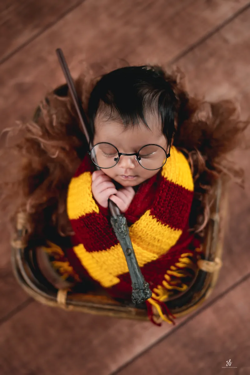Carefully styled newborn portrait preserving the smallest days · 06