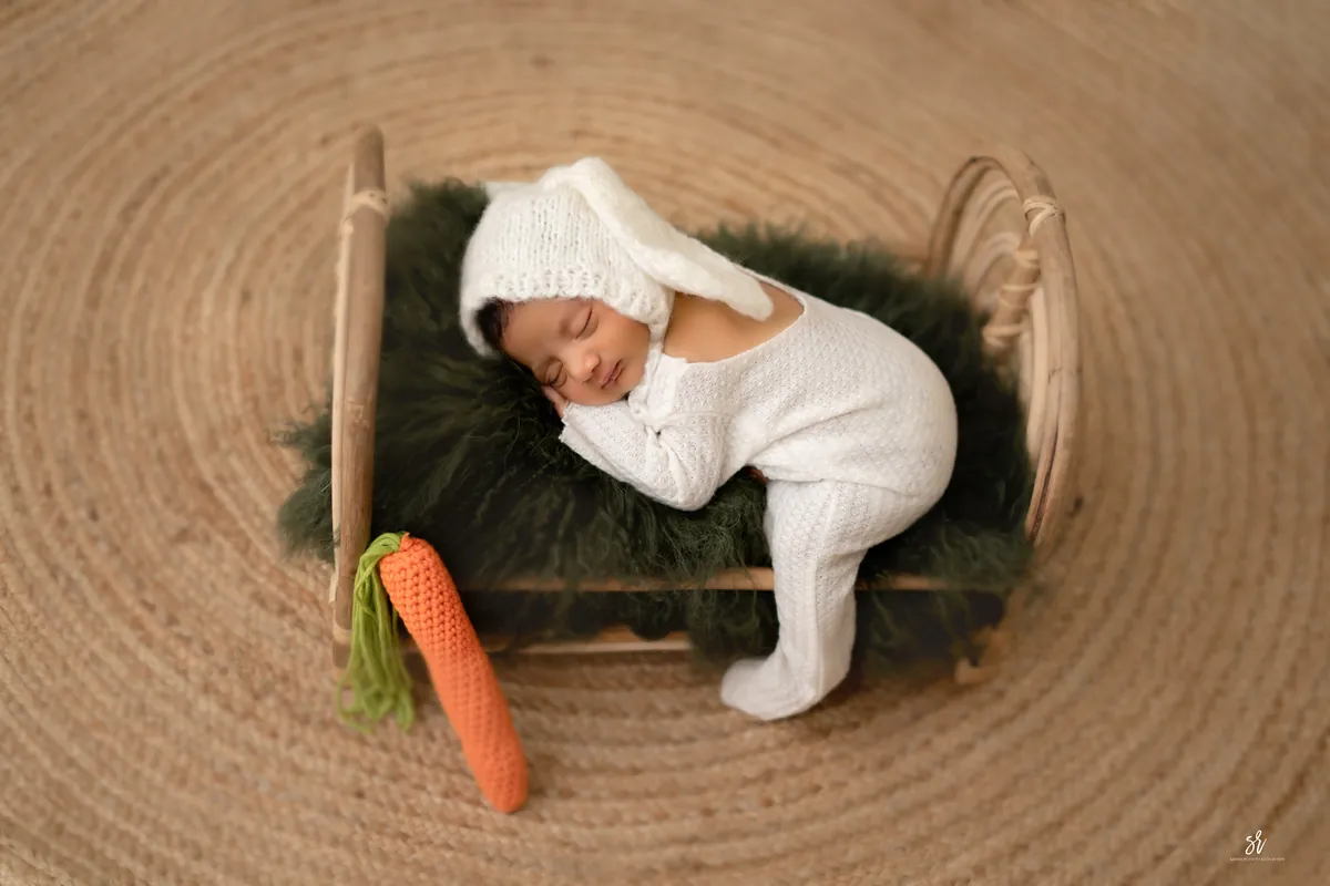 Carefully styled newborn portrait preserving the smallest days · 10