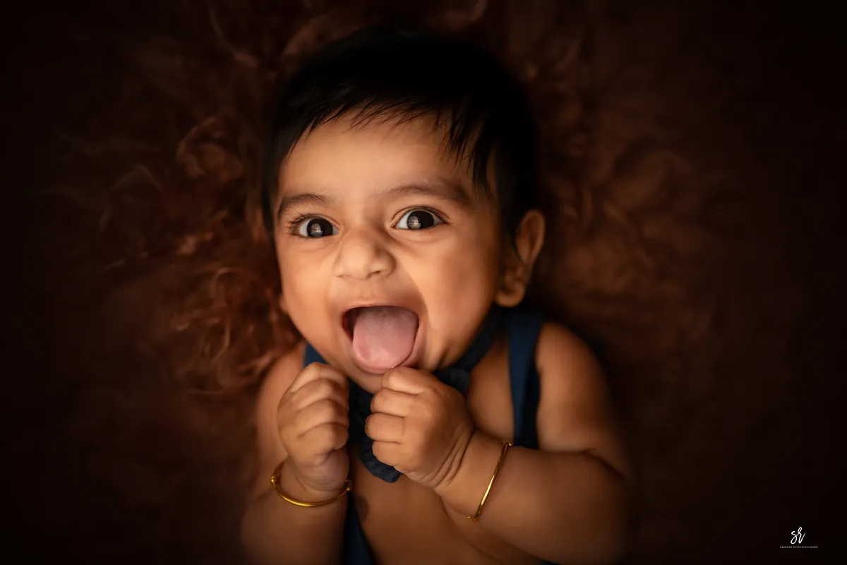 Carefully styled newborn portrait preserving the smallest days · 13