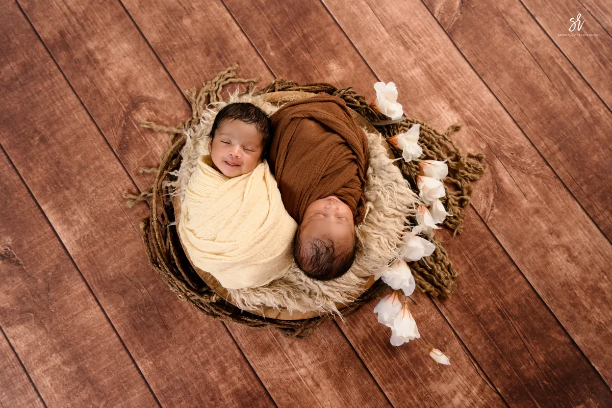 Carefully styled newborn portrait preserving the smallest days · 15