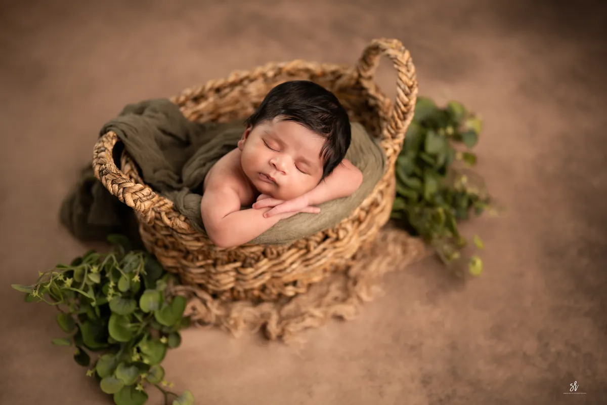 Carefully styled newborn portrait preserving the smallest days · 29