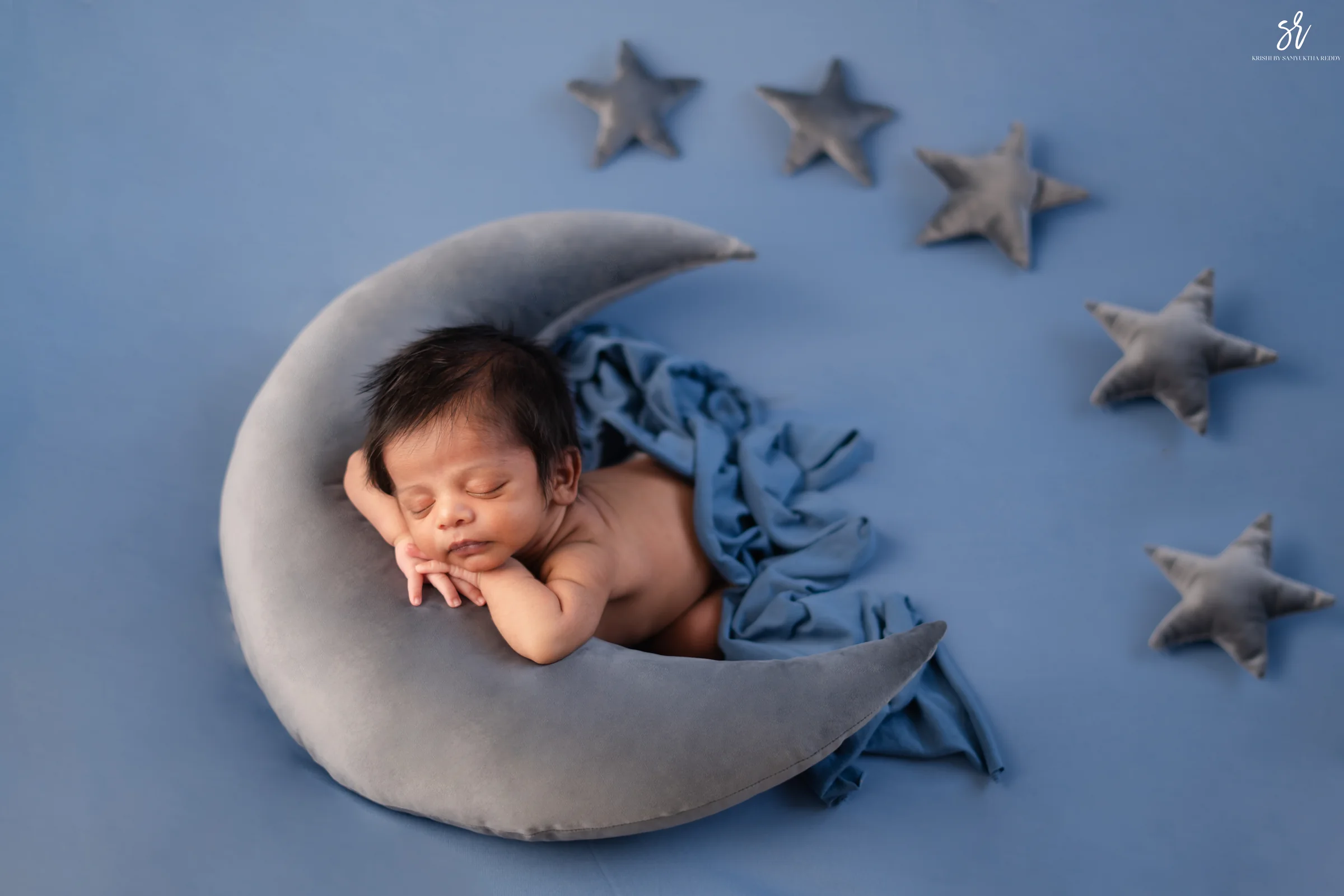 Carefully styled newborn portrait preserving the smallest days · 14